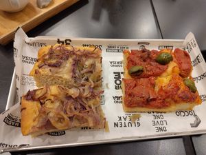 Focaccia with Onions and Focaccia with sugo and green olives at Forno Brisa - Via Castiglione in Bologna