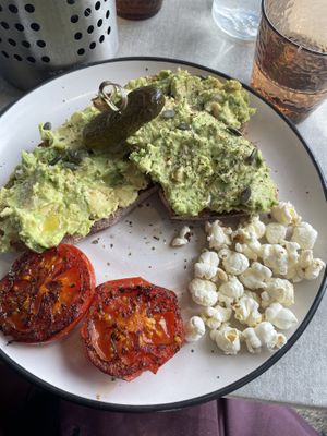 Avo toast with grilled tomato  at Ninna's Kitchen in Brighton