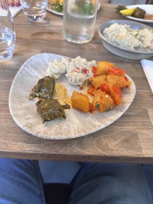 Wine leaf filled with rice, potatos, hummus and baba ganoush  at Lebanese Please in Weybridge