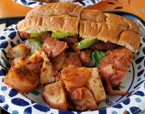 Sausage Po Boy and Cajun Potatoes  #Veganuary at Meals From The Heart Cafe in New Orleans