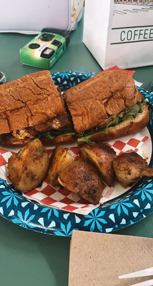 spicy sausage po boy  at Meals From The Heart Cafe in New Orleans