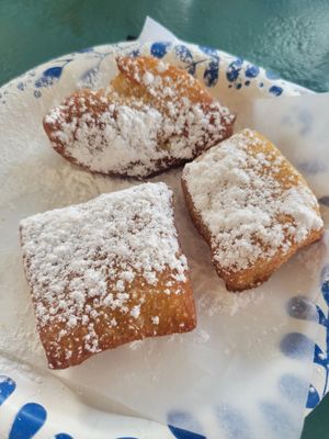 Vegan beignets (this is a dessert plate, not a dinner plate to reference size) at Meals From The Heart Cafe in New Orleans