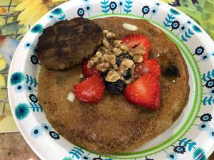 Vegan blueberry pancakes with an apple sausage party. Incredible!  at Meals From The Heart Cafe in New Orleans