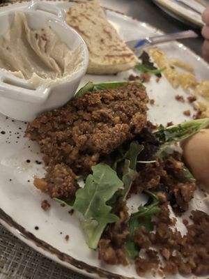 Half eaten (vegan kebab, hummus, pitta and chips with side salad)   at Steve's in Paphos