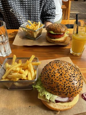 Beyond meat burger with fries and orange juice at Charcutaria e Queijaria do Mercado in Funchal
