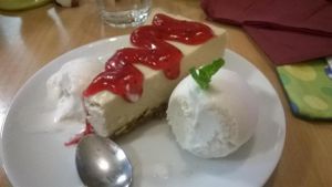cheesecake with coconut ice cream at Three Pillars Cafe in New Plymouth