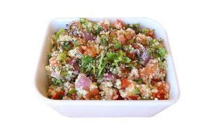 Refreshing, light and packed with healthy ingredients: fresh herb and bulgur salad, dotted with tomatoes. Dressed with extra virgin olive oil and lemon juice. at Habibi Kush in Miami