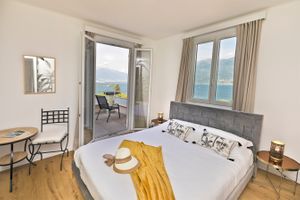 Comfort room with balcony and lake view at Garden Hotel Primavera in Brissago