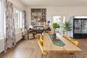Lobby with coffee machine and fridge with snacks and drinks at Garden Hotel Primavera in Brissago