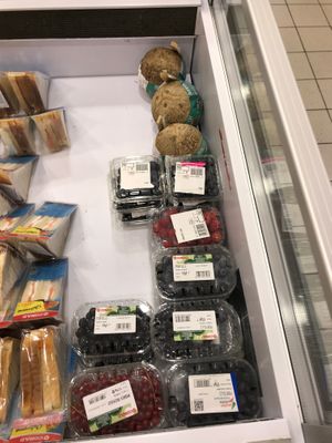 Fruit, including coconuts at Conad Akademia in Tirana