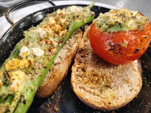 Vegetarian pepper and tomatoe stuffed with feta and guacamole, it can be also with tofu to be fully vegan! at Paprika in Valencia