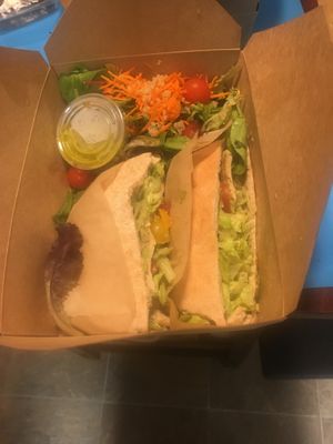 chicken pita sandwich with salad at The Grain Cafe in Van Nuys