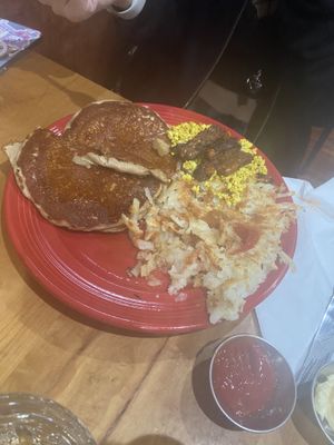 Bacon tempeh with scrambled tofu, hashbrowns, and pancakes  at The Grain Cafe in Van Nuys