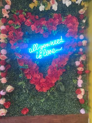 Adorable Floral Wall w/“All You Need Is Love” 💖  at The Grain Cafe in Van Nuys