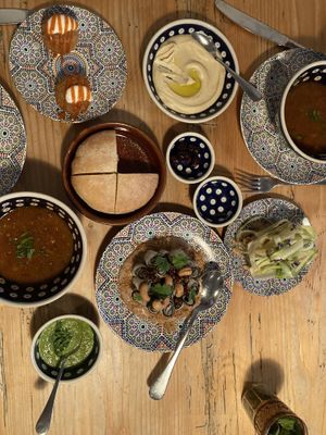 We took the tasters menu at 72chf pp. The first course was delicious! Lentil chickpea soup, Spanish omelette, fried potato, radish with sauce, hummus, olives and coriander sauce!   at DAR Restaurant & Cocktail Bar in Zurich