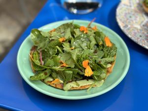 Corn tostada with Kefta spread and herb yogurt  at DAR Restaurant & Cocktail Bar in Zurich
