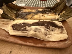 Frijol com hoja de aquacate (delante) Mole Negro (detras)  at Nuni Tamales in Tijuana