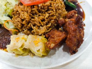 The extra gu-lao-rou mock meat and siew mai at Vegetarian 素 - Peninsula Plaza in Central Singapore