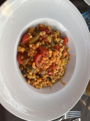 Fregola pasta with aubergine, pepper, tomato  at Mamacita Café in Sarchittu