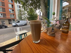 Oat milk latte and Turmeric kombucha   at Targa Green Cafe in East London