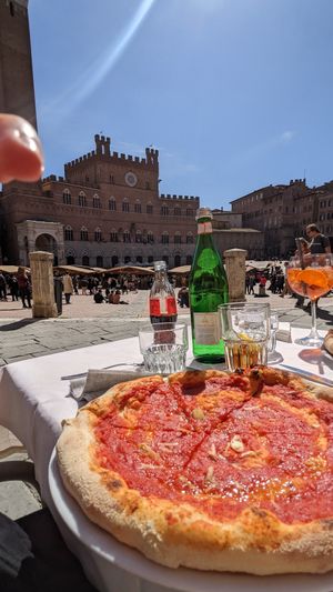 Pizza Marinara. It wasn't on the menu but you can request it - it was pretty expensive (14 euros) at Bar Il Palio in Siena
