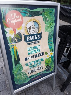 poster on pavement at Paul's Food Boutique in Kortrijk