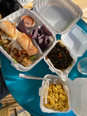 May be the best vegan mac I’ve had. Greens are delicious and Philly fake steak too! at Banu Vegan in Durham