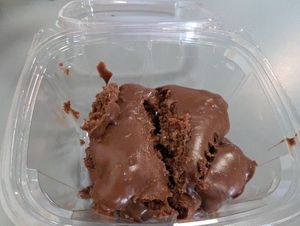 Really good chocolate cake... So excited I cut it before taking the picture 🤣 at Banu Vegan in Durham