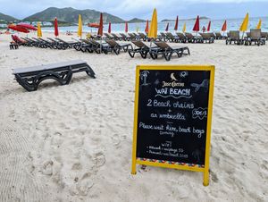 Umbrellas and chaises. at Waï Plage in Orient Bay