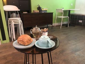 Vegan pain au chocolat with Jasmine tea  at Atlas Grinds in North London