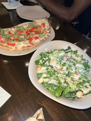 The Margarita Pizza and Kale Caesar Salad  at Mantra Kitchen in Houston