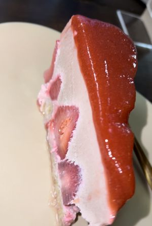 Raw Strawberry Coconut Cheesecake — the jam/jelly on top is what sets this OFF🤩  at Mantra Kitchen in Houston