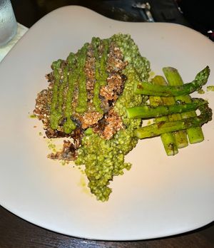 Maitake Chimichurri over millet with grilled asparagus (my FAVORITE thing on their menu!!😻)  at Mantra Kitchen in Houston
