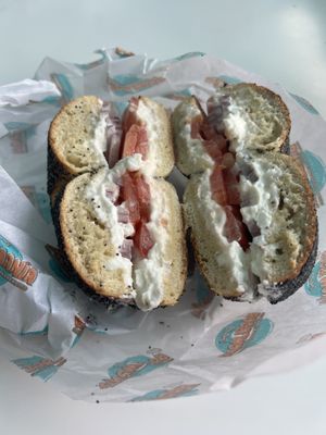 Poppy bagel with vegan cream cheese, tomato and onion  at Siegel's Bagelmania in Las Vegas