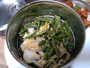 From the Thai tempeh menu: 'Long beans in an umami rich sauce' at Dabba Dinner in Nijmegen