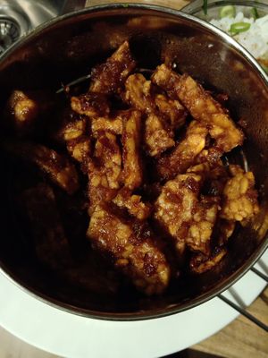 From the rendang dabba menu: 'Crispy tempeh in a homemade tamarind sambal' at Dabba Dinner in Nijmegen