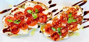 Vegan caprese toast with basil pesto and cashew milk cheese at Coco Bistro & Bar in Chapel Hill