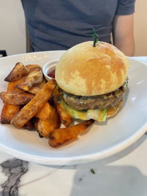 Burger with beer cheese and house fries   at Coco Bistro & Bar in Chapel Hill