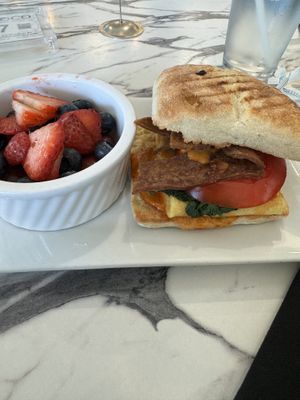 Egg and bacon with tomato, spinach and chipotle sauce. Excellent!  at Coco Bistro & Bar in Chapel Hill