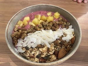 Pink Pitaya bowl with in house made granola, fresh coconut, banana and dragonfruit  at The Sane Sister  in Willemstad