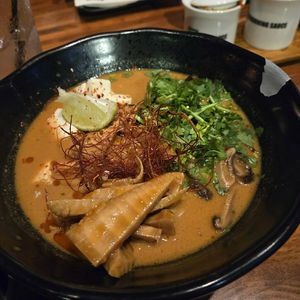 Red fire opal bowl with sautéed bamboo shoots at JINYA Ramen Bar in Charlotte