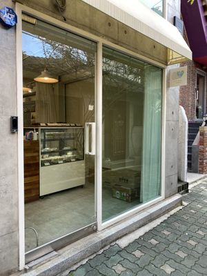 Bakery interior/exterior - it’s a tiny shop with just a counter to order at   at Jigu Bakery - 지구제과 in Seoul