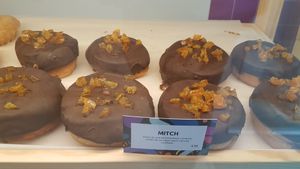 Orange chocolate doughnuts at Bungnuts vegan Doughnuts. in Barcelona