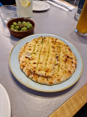 Incredible pita with garlic, olive oil, and parsley at Maray - Dockside in Liverpool