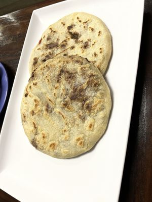 Garlic pupuso with beans and no cheese  at Pupusas 503 in Charlotte
