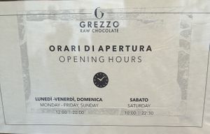 It actually opens at 12 noon every day, staff confirmed   at Grezzo Raw Chocolate in Rome