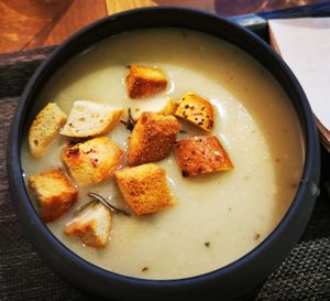 Roasted garlic cream soup with rosemary and croûtons at The Planteen in Budapest