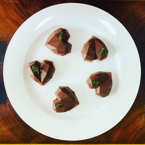 Mylk Chocolate Hearts filled with Raspberry Gel at Happily Ever Vegan in Corio