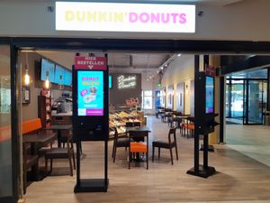 Exterior inside mall at Dunkin' in Abtwil