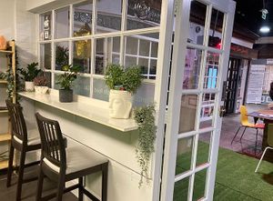 Inside seating  at The London Feel Good Hub Vegan Cafe in East London